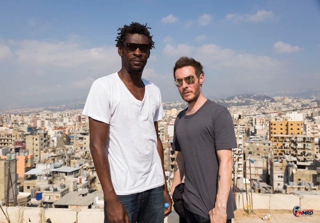 Massive Attack Dilarang Tampil Lagi di Singapura Usai Kibarkan Bendera Palestina dan Serukan 'Free Palestine' di Atas Panggung